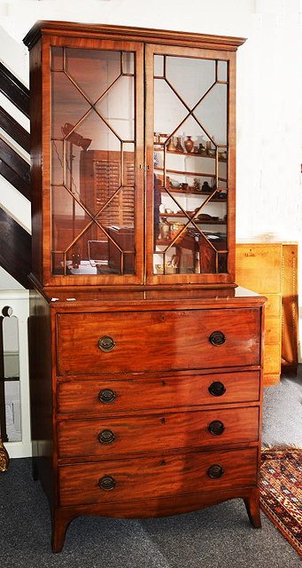 Appraisal: A TH CENTURY MAHOGANY SECRETAIRE BOOKCASE top section with glazed