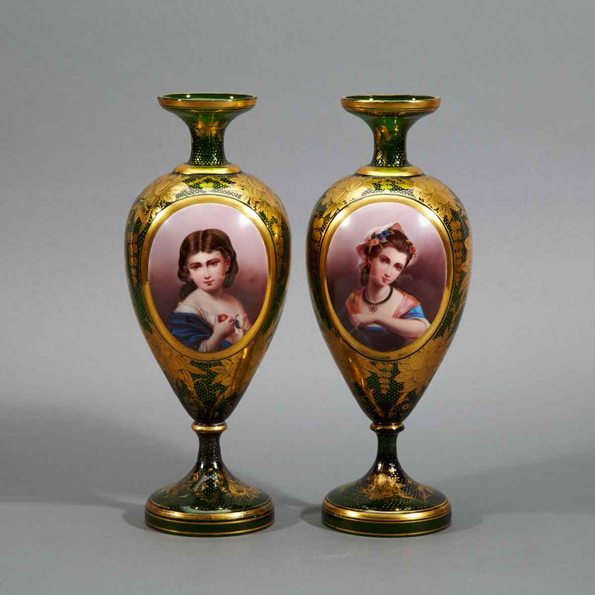 Appraisal: Pair of Bohemian Green and Gilt Glass Enameled Portrait Vases