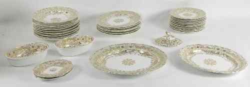 Appraisal: A Davenport part dinner service decorated in gold and grey