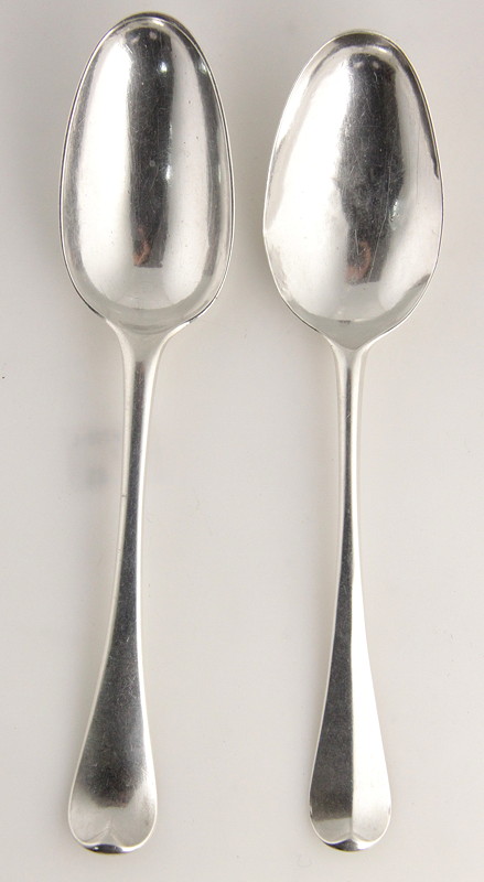 Appraisal: A Hanoverian pattern silver table spoon London and a similar