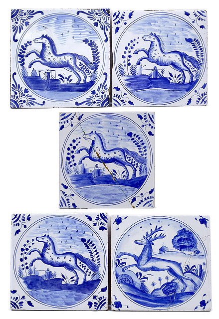 Appraisal: A set of five reproduction Delft blue and white tileseach