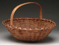 Appraisal: GOOD WOOD BOTTOMED CENTER HANDLE OVAL BASKET Possibly of Nantucket