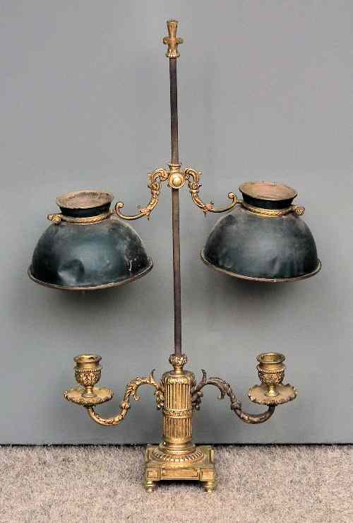 Appraisal: A French gilt brass and japanned metal twin sconce table