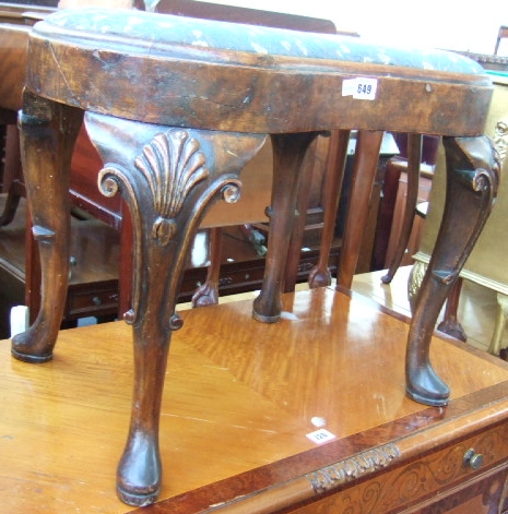 Appraisal: A th century walnut foot stool the kidney shaped top