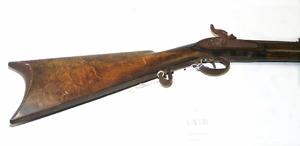 Appraisal: A reproduction American full-stocked percussion rifle The inch browned octagonal