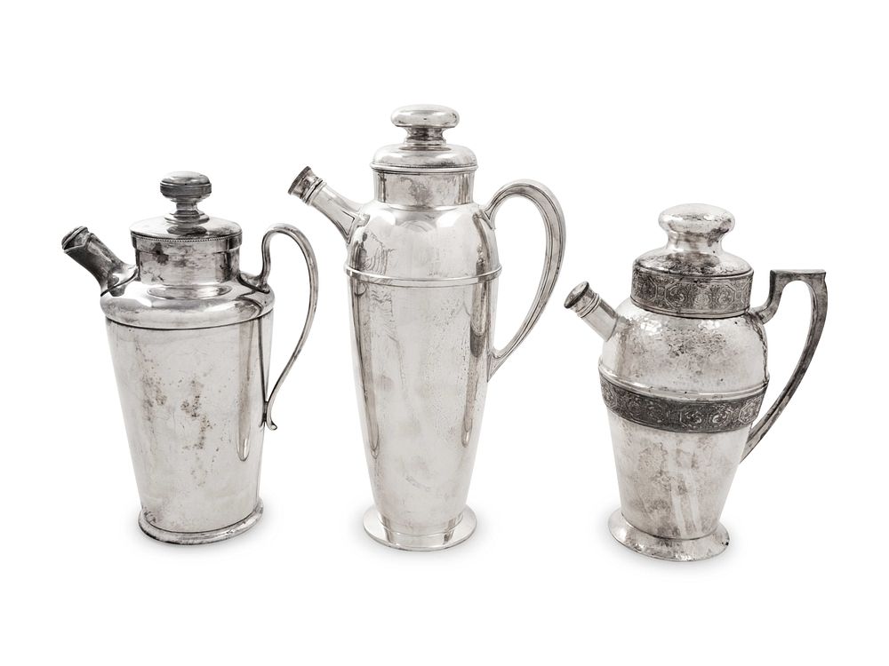 Appraisal: A Group of Three Silver-Plate Cocktail Shakers A Group of