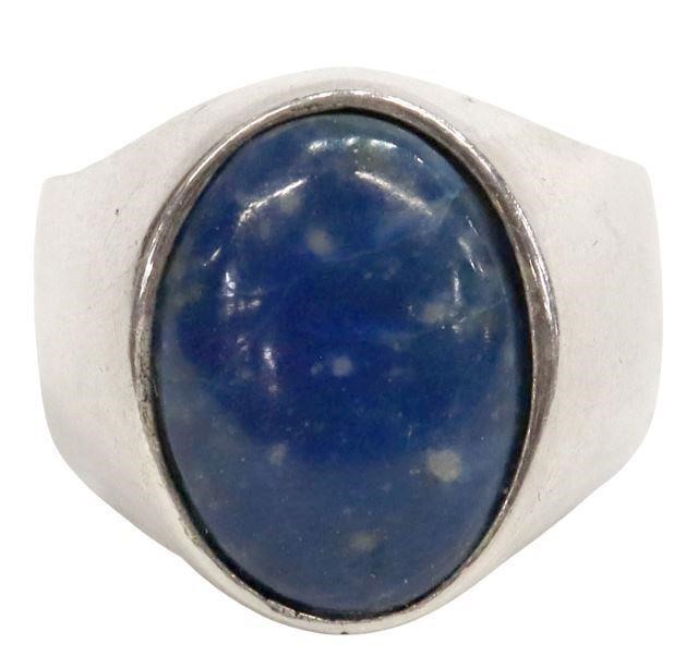 Appraisal: Gent's silver ring fitted with oval blue stone cabochon likely