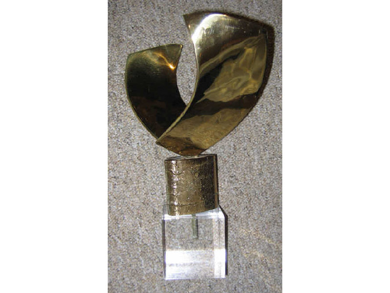 Appraisal: BUD LEWIN AMERICAN Polished bronze winged sculpture on acrylic base