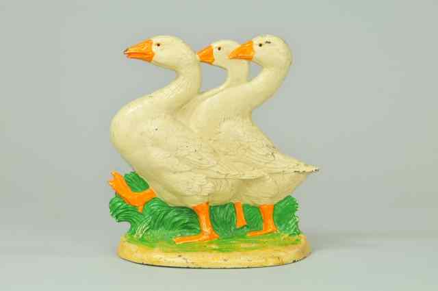 Appraisal: THREE GEESE DOORSTOP BOOK EXAMPLE cast iron Hubley marked ''