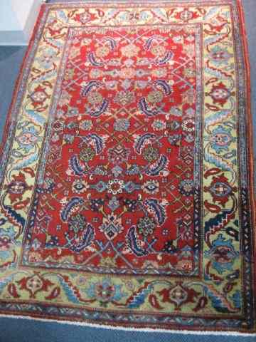 Appraisal: Heriz Persian Handmade Rug stylized floral geometrics red field '