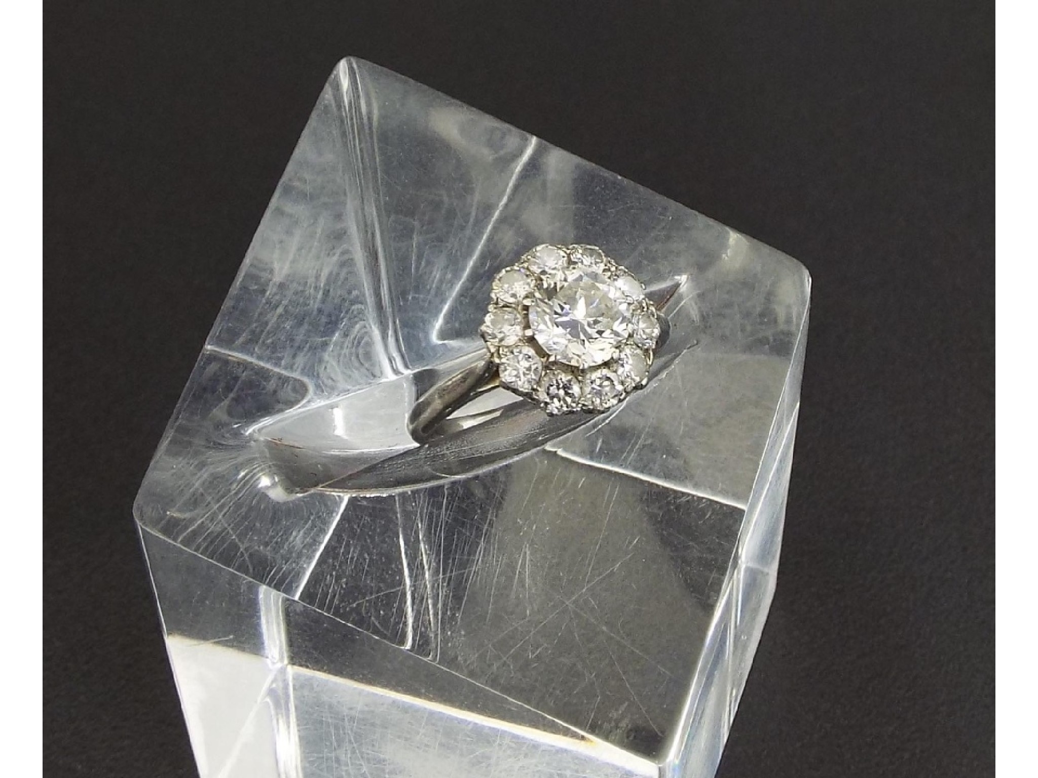 Appraisal: Platinum diamond cluster ring the principal round brilliant cut diamond