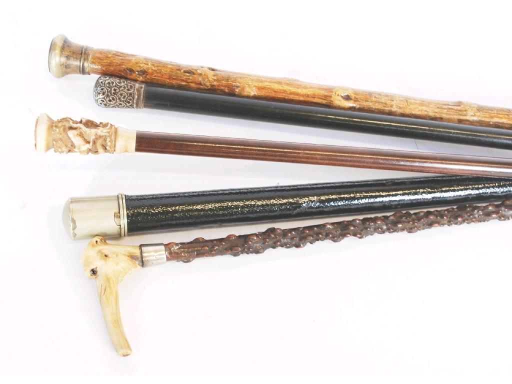 Appraisal: FIVE VARIOUS WALKING STICKS including TWO BONE HANDLED EXAMPLES EST