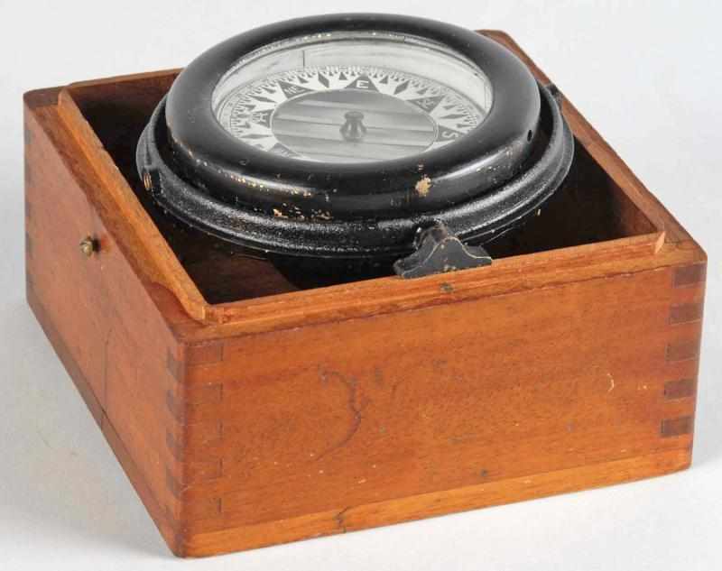 Appraisal: Metal Wilcox Crittenden Compass in Wooden Box Description Dated Working