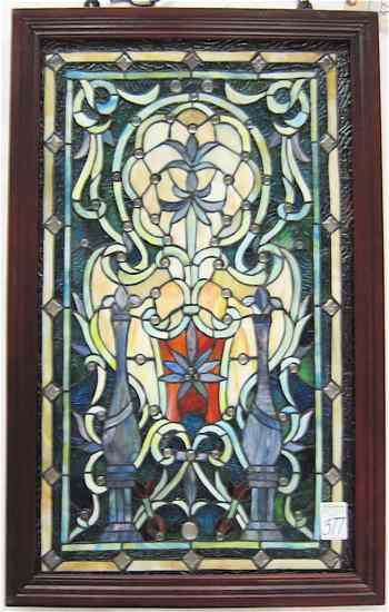 Appraisal: STAINED AND LEADED GLASS WINDOW PANEL in a stylized floral