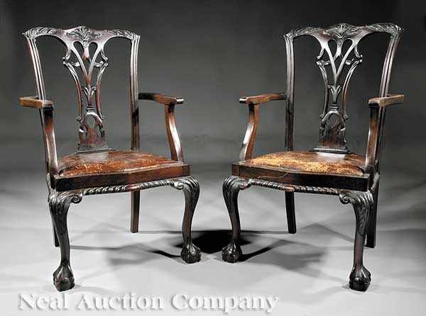 Appraisal: A Pair of Chippendale-Style Carved Mahogany Armchairs early th c