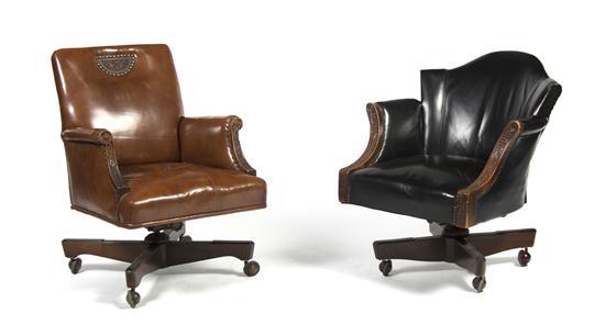 Appraisal: Two Leather Upholstered Armchairs having carved frames Height of first