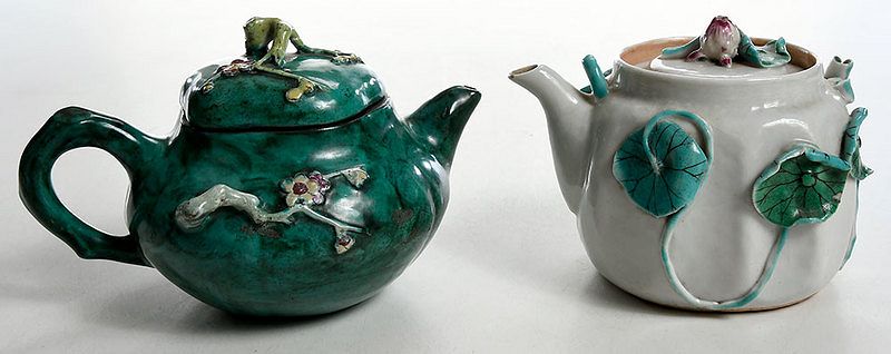 Appraisal: Two Chinese Teapots with Floral Decoration probably Qing dynasty yixing