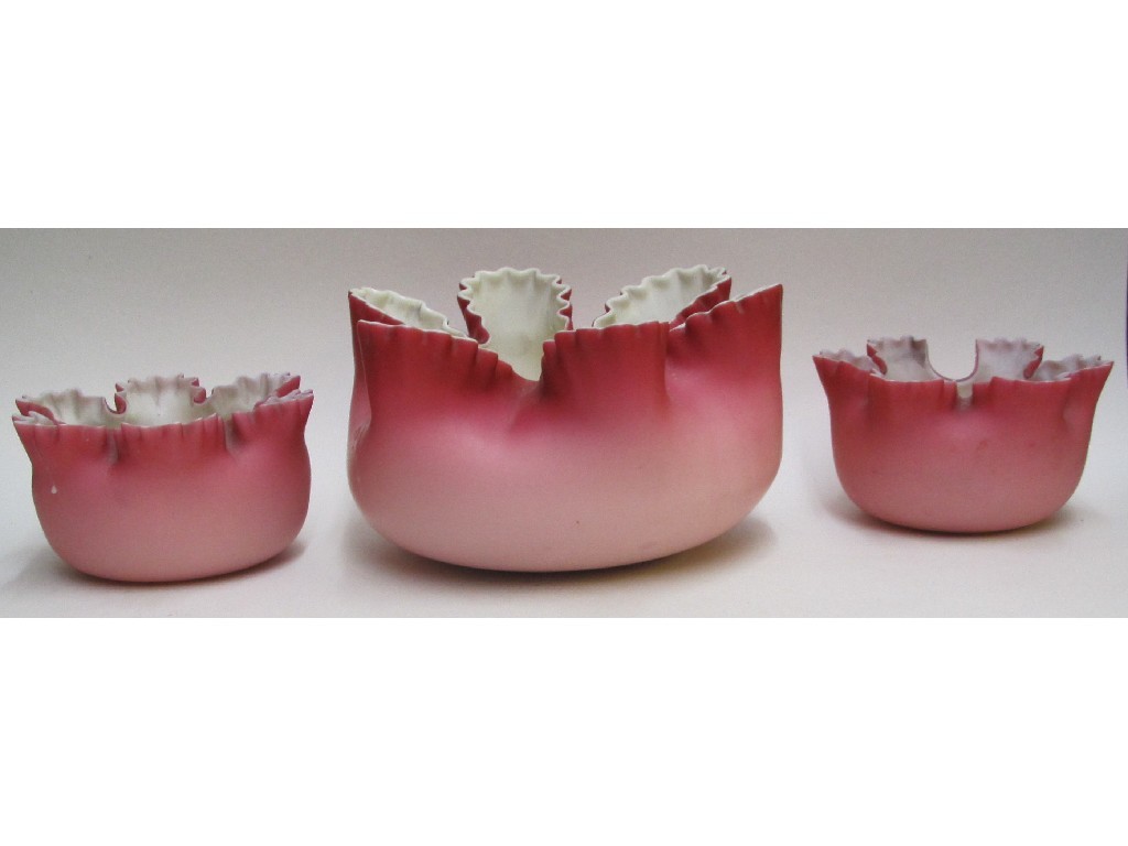 Appraisal: A Burmese satin glass frilly pink ground bowl cm diameter