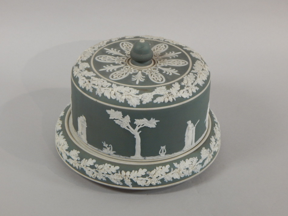 Appraisal: A thC green Jasperware cheese dish and cover decorated in