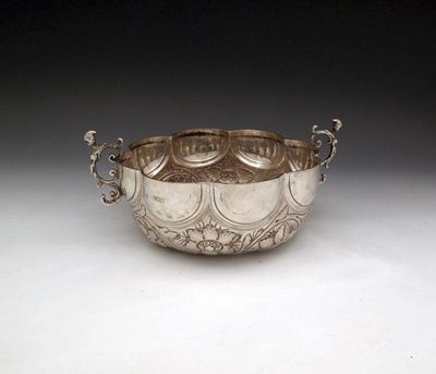 Appraisal: An Edwardian silver two-handled bowl by J Carrington London in