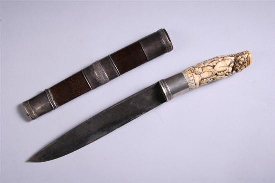 Appraisal: INDONESIAN IVORY AND SILVER MOUNTED STEEL DAGGER th century Silver