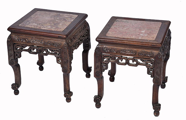 Appraisal: A PAIR OF CHINESE PADOUK WOOD SQUARE TOPPED URN STANDS