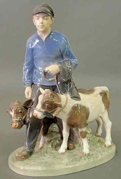 Appraisal: Royal Copenhagen figural group of a farmer and two calves