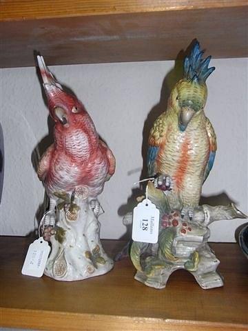 Appraisal: A PAIR OF CONTINENTAL FIGURES OF PARROTS each on a