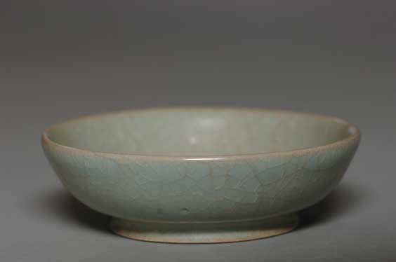 Appraisal: ANTIQUE GUAN-TYPE CRACKLE DISH Antique Chinese Guan-type celadon crackle glazed