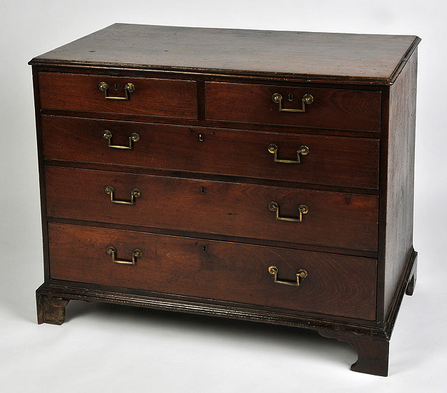 Appraisal: A GEORGE III COUNTRY OAK CHEST OF DRAWERS with two