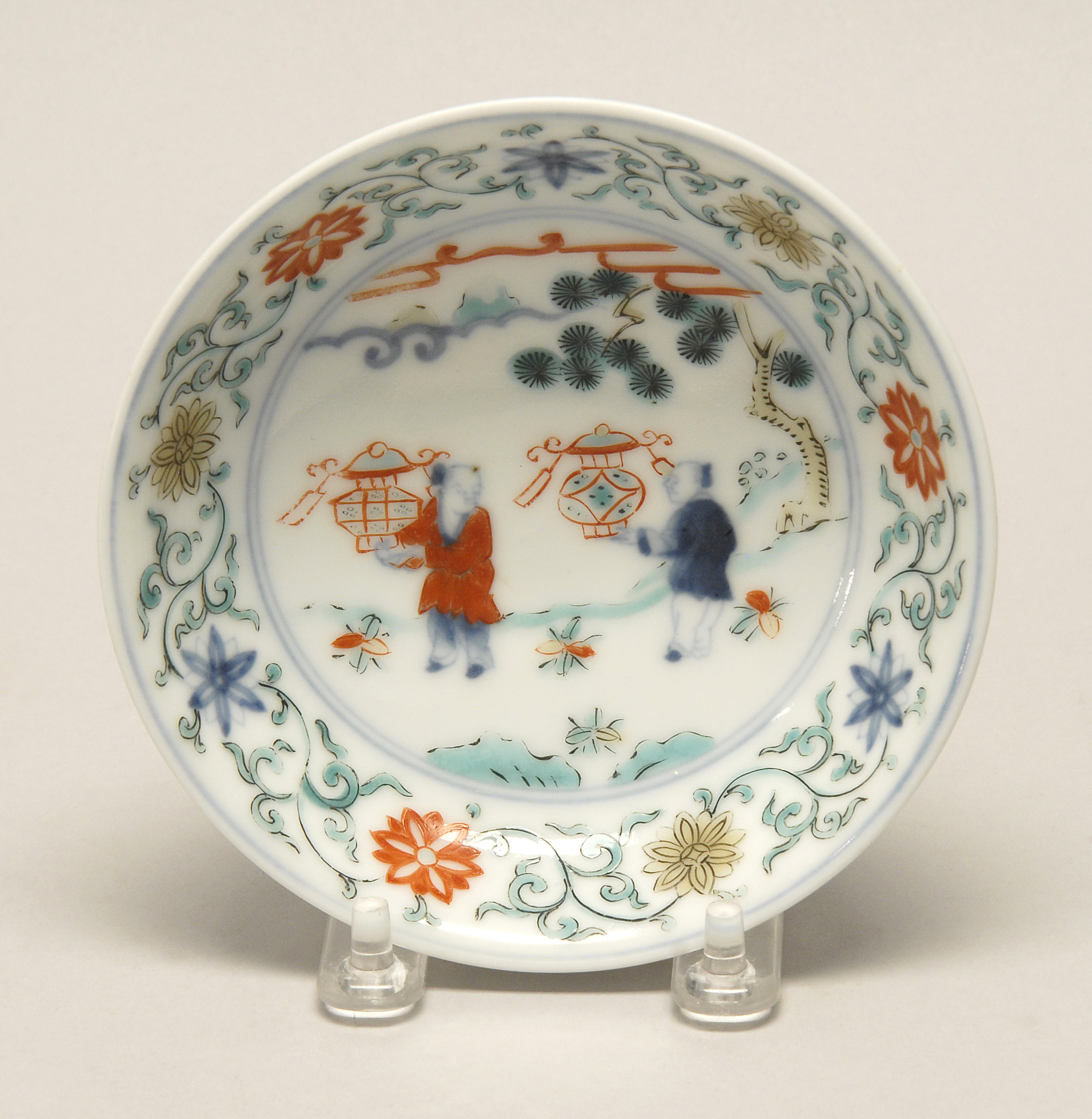 Appraisal: DOUCAI PORCELAIN LOW BOWL th CenturyCircular decorated with two figures