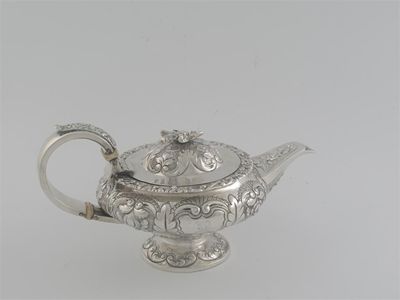 Appraisal: A George IV bachelor's teapot of squat circular form with