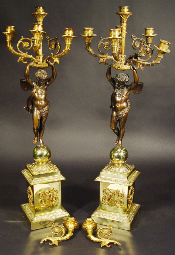 Appraisal: Pair of bronze and ormolu five branch candelabra in the