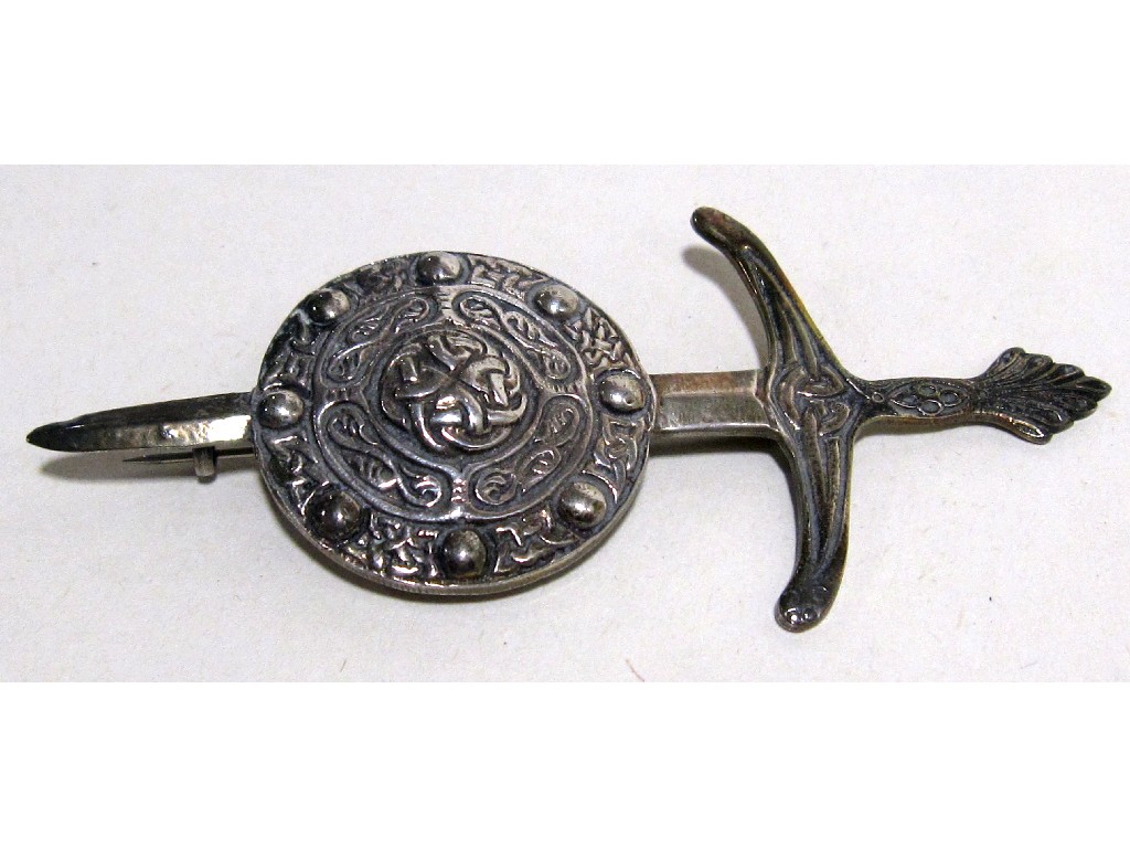 Appraisal: Scottish silver sword and shield brooch the shield with knotwork