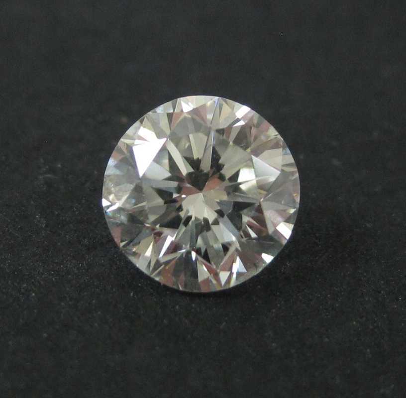 Appraisal: UNSET ROUND BRILLIANT-CUT DIAMOND weighing ct clarity grade SI color