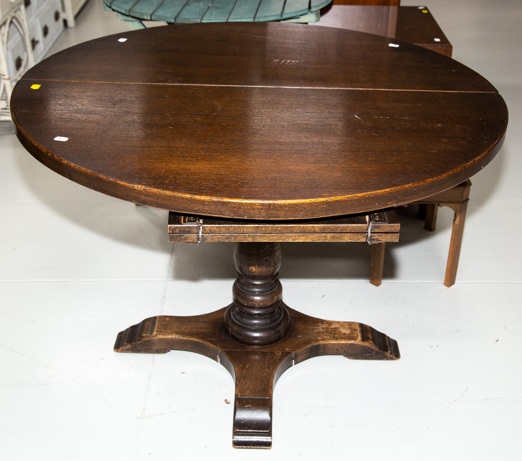 Appraisal: AMERICAN OAK DINETTE TABLE Early th century with a folding