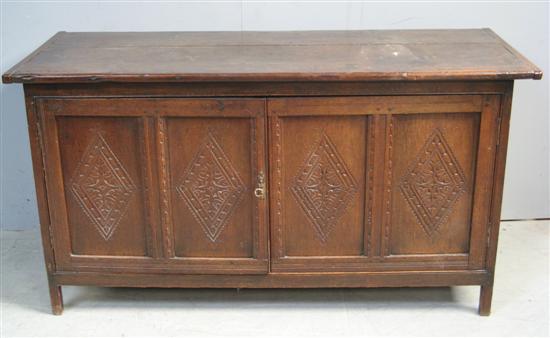 Appraisal: th Century oak coffer converted to a cupboard with two