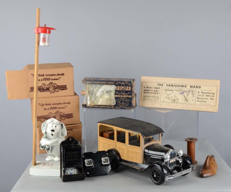 Appraisal: Lot Of Automotive Items Ford Banks Decanter This lot of