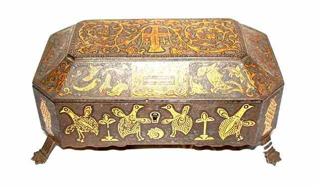 Appraisal: AN INDIAN IRON CASKET of eight sided form with hinged