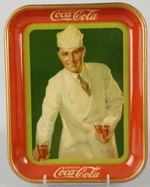 Appraisal: Coca-Cola Serving Tray with Soda Jerk Description Strong colors and