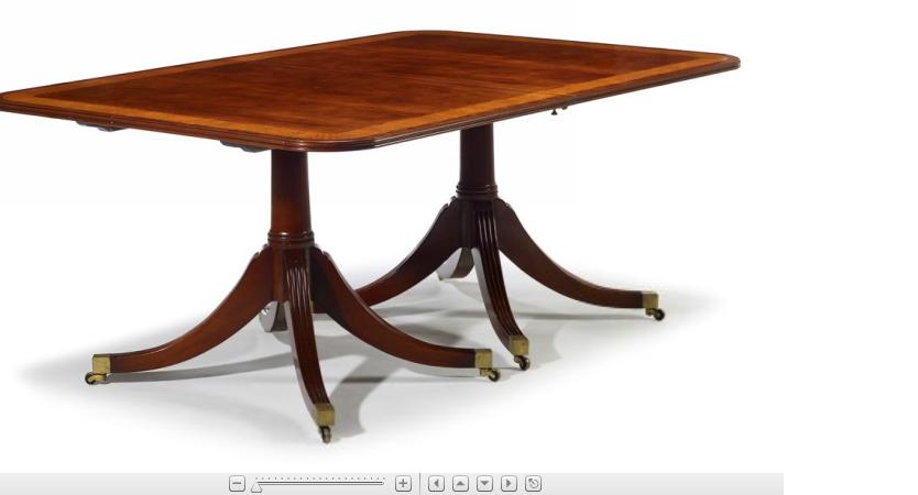 Appraisal: George III style cross banded mahogany twin pedestal dining tableThe