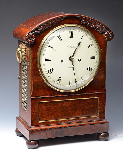 Appraisal: A TH CENTURY MAHOGANY MANTEL OR TABLE CLOCK the convex