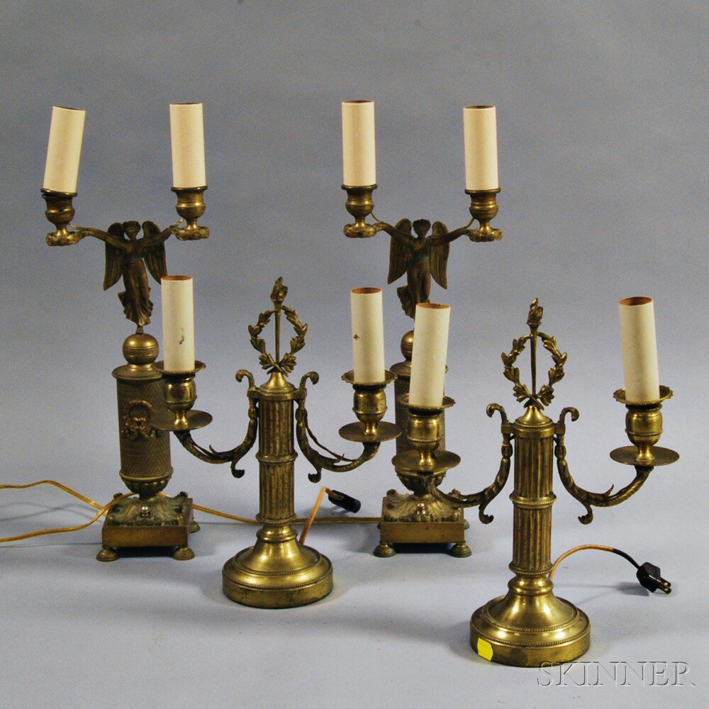 Appraisal: Two Pairs of Two-light Brass Lamps one pair with laurels