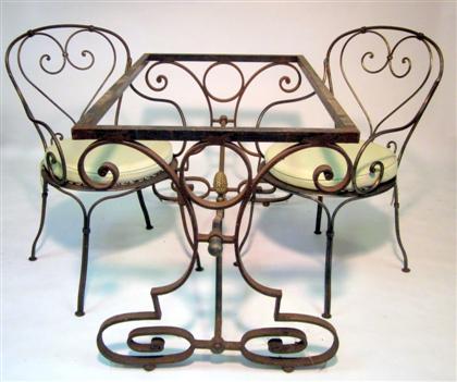 Appraisal: Three art nouveau steel chairs The heart shaped splat over