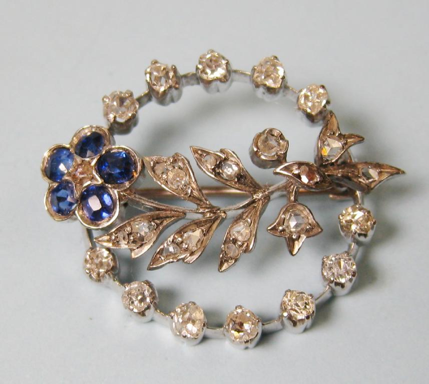 Appraisal: A circular Flower Brooch set twenty eight diamonds and five