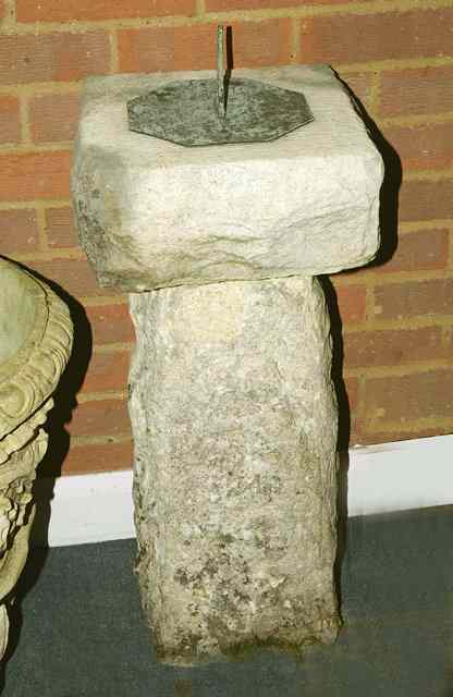 Appraisal: AN OLD STONE SUNDIAL of rough cut form with octagonal