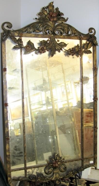 Appraisal: An antique French wall mirror with pressed tin floral and