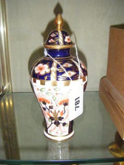 Appraisal: A Royal Crown Derby baluster shaped vase and cover in