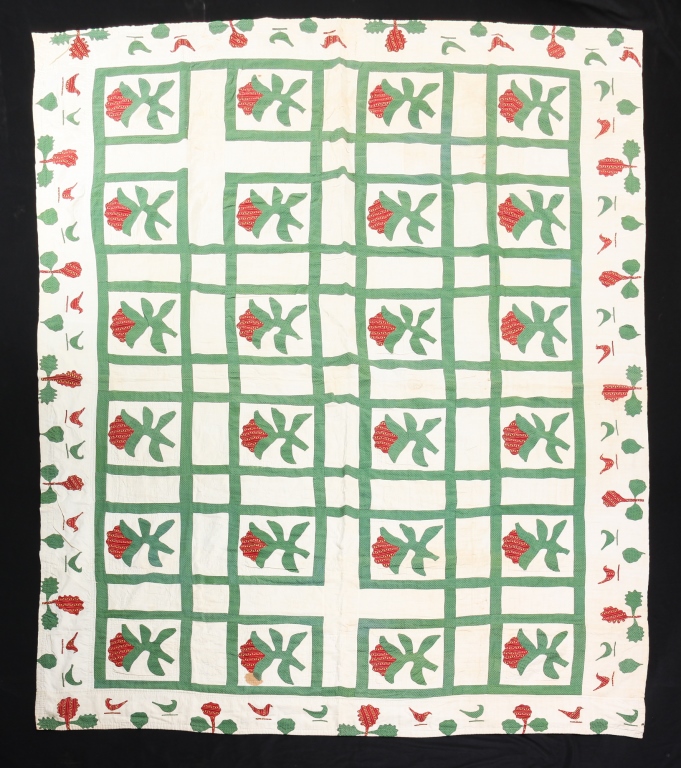 Appraisal: AMERICAN APPLIQUE QUILT Late th century Hand stitched floral grid