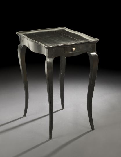 Appraisal: Louis XV-Style Ebonized Occasional Table the shaped rectangular top with